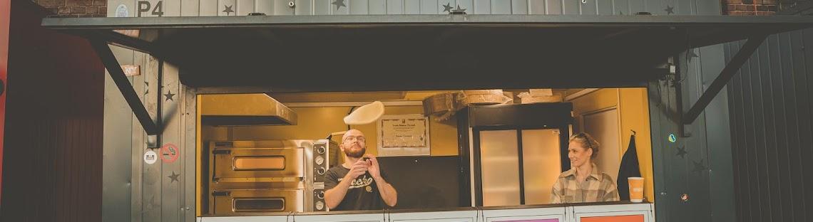 Slice in Hand Pizza