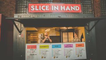 Slice in Hand Pizza